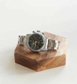 Silver round analog watch